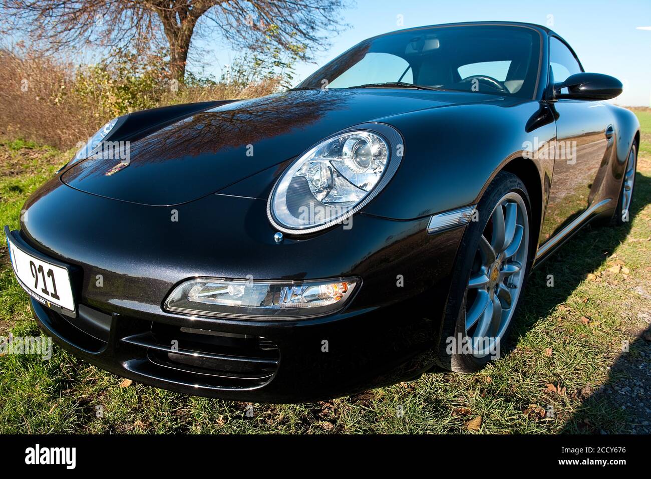 Porsche 911 Carrera 4S Cabriolet, series 997, round headlights, all-wheel  drive, Germany Stock Photo - Alamy