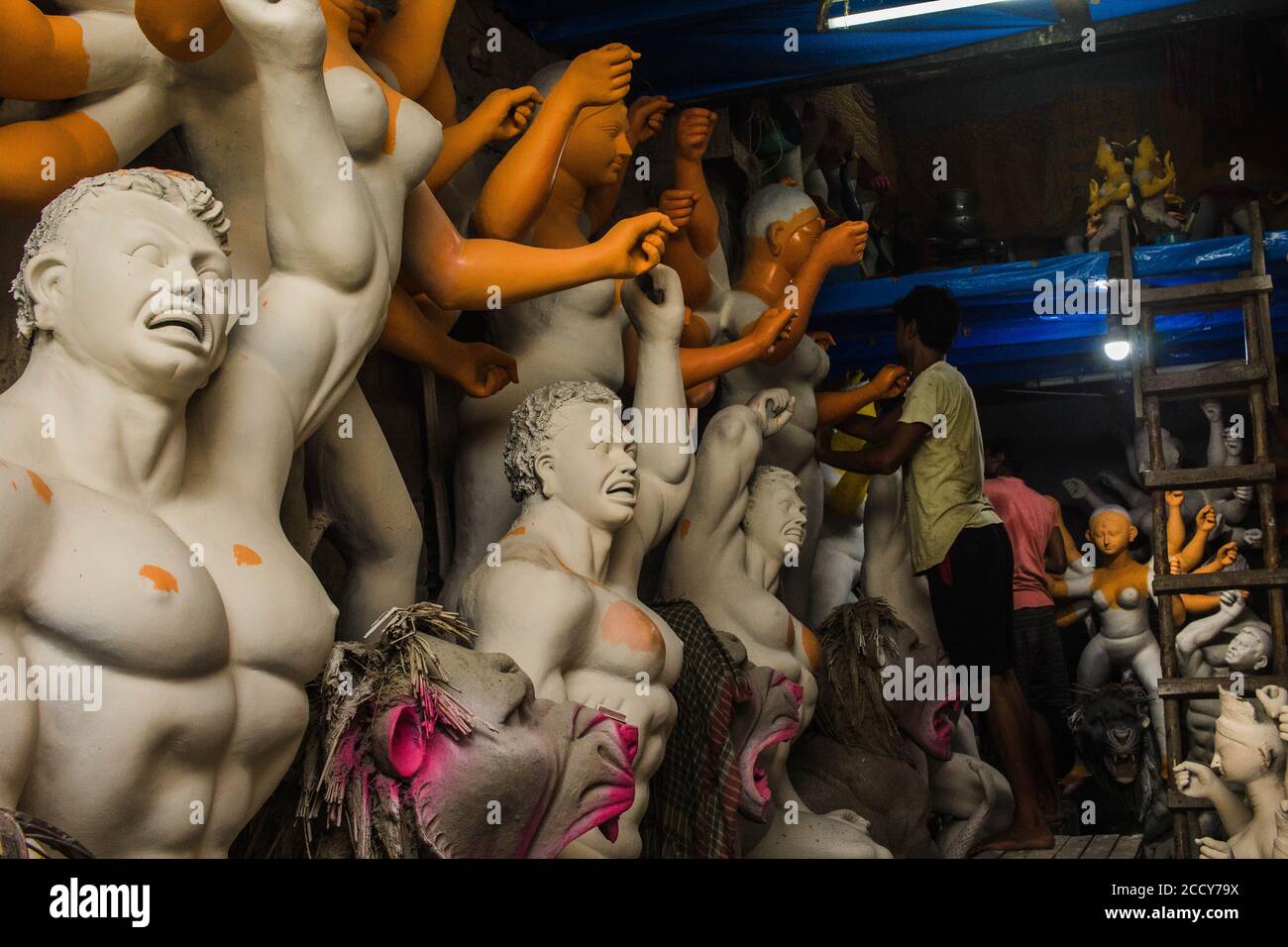Sculptors making idol Of Goddess Durga at kolkata Stock Photo