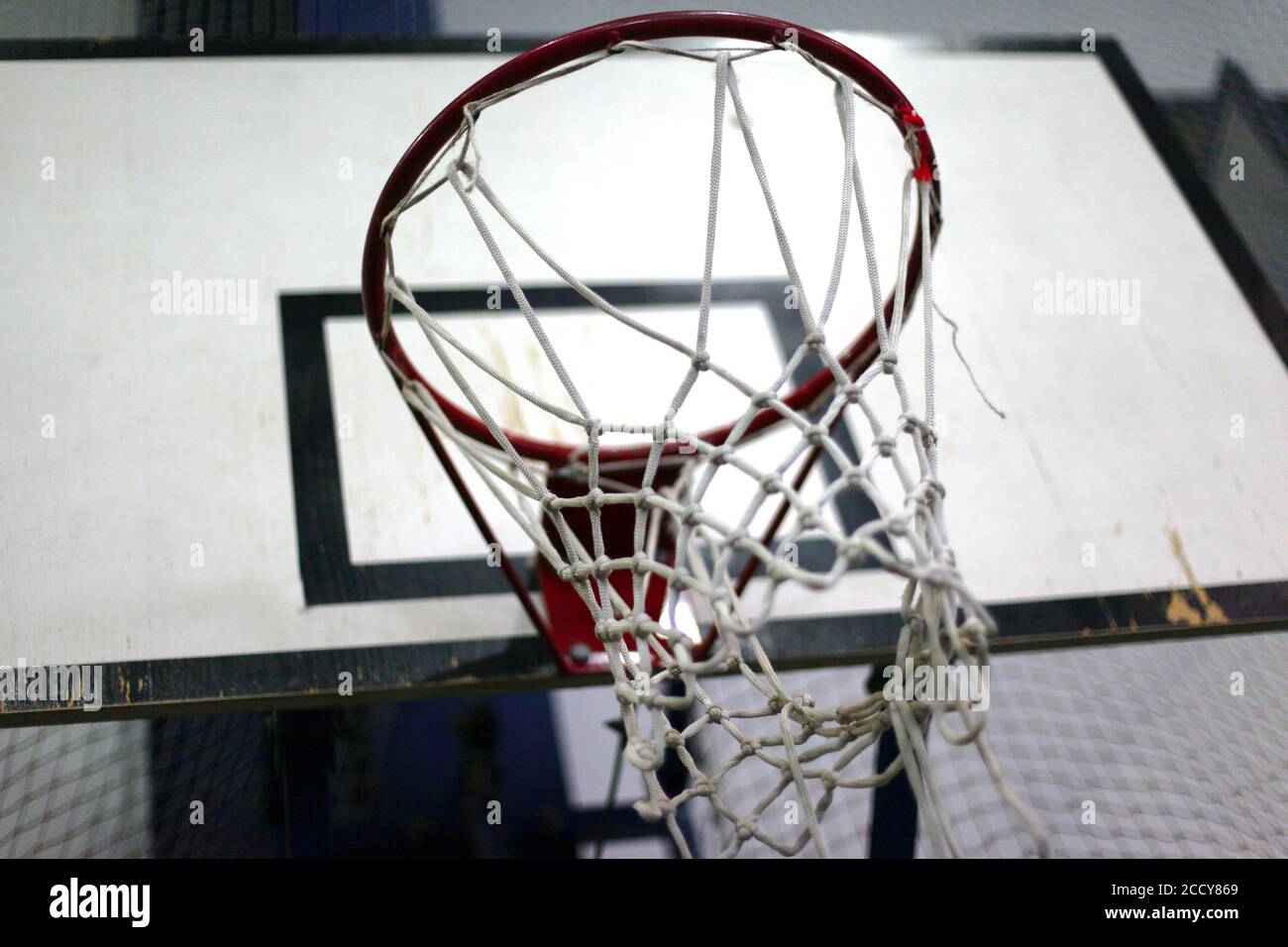 Basketball ring with a net for playing basketball indoors Stock Photo