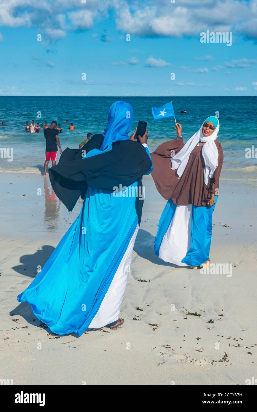 Local women posing for photos on Lido beach, Mogadishu, Somalia Stock Photo