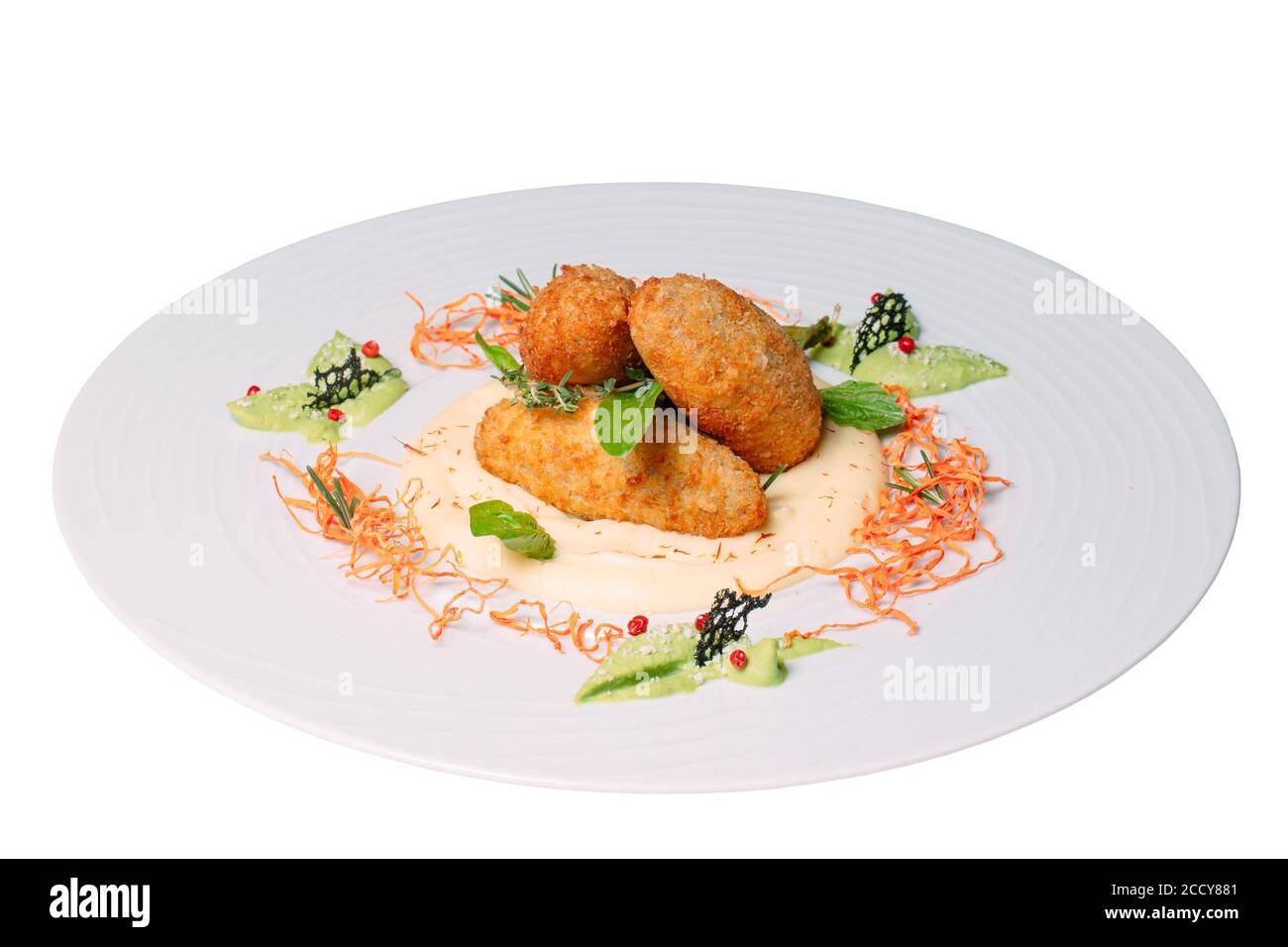 Dish with cutlets on a white background. Stock Photo