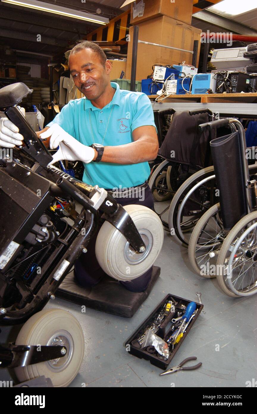Wheelchair Services Manager services an NHS wheelchair in