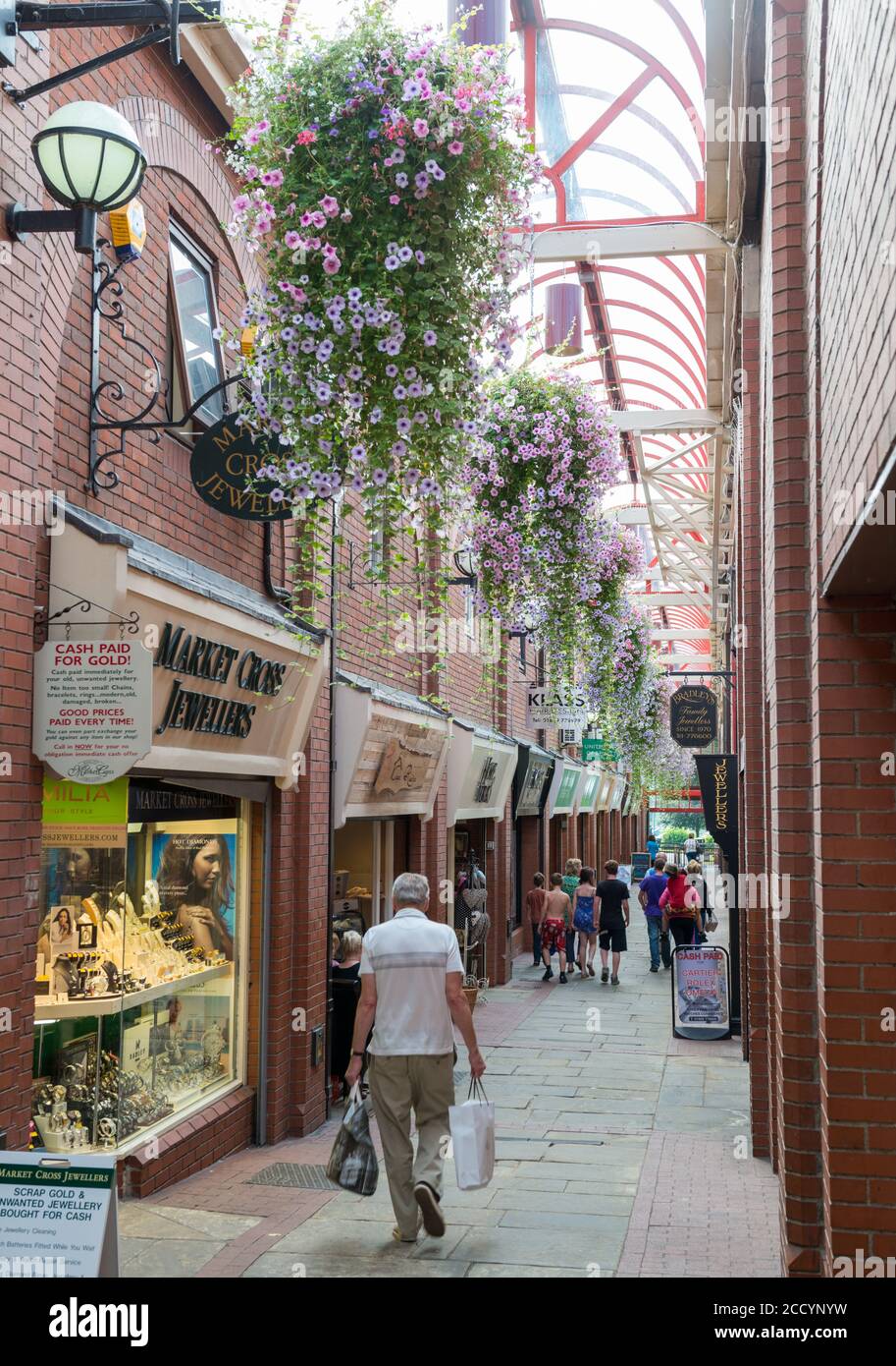 Shops along Market Row - Barkers Arcade - in the town centre of Northallerton, North Yorkshire Stock Photo