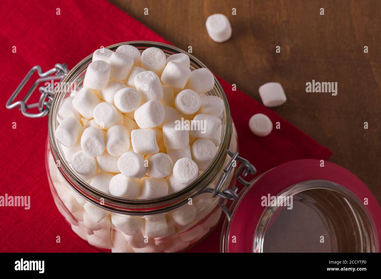 White mini marshmallows in the jar for storage Stock Photo Alamy