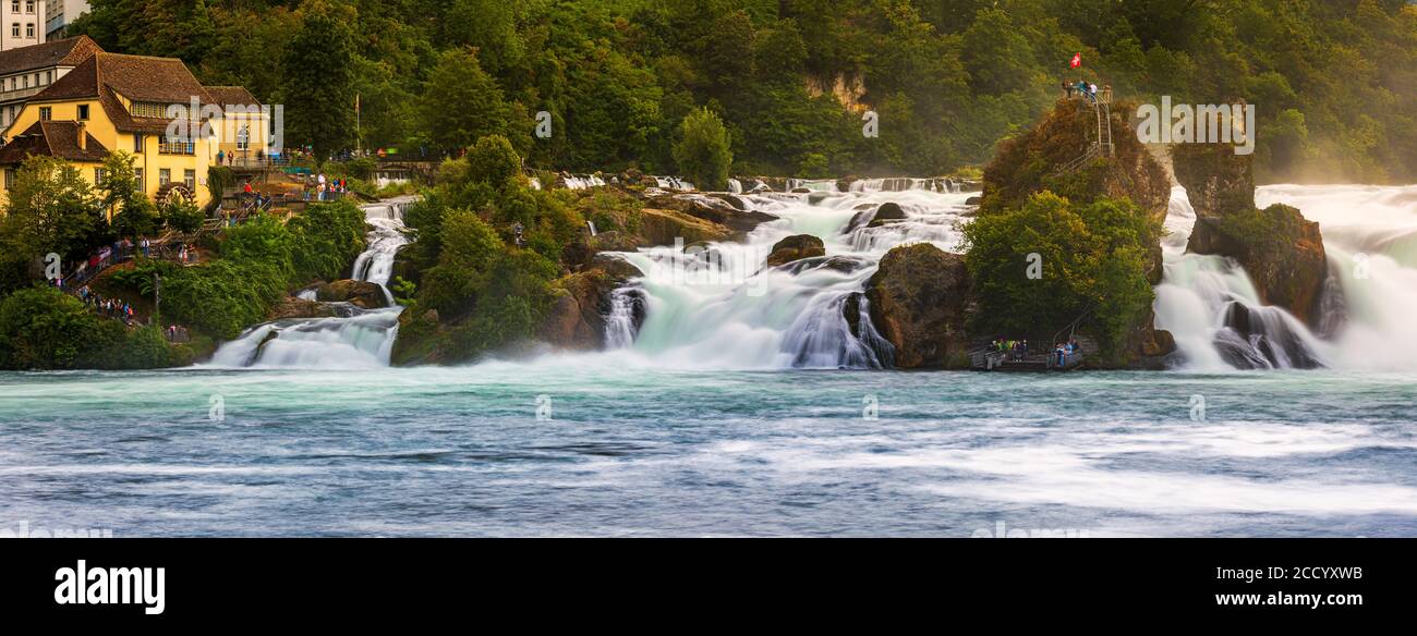 The Rhine Falls (German: Rheinfall) is the largest waterfall in Switzerland and Europe. The falls are located on the High Rhine on the border between Stock Photo