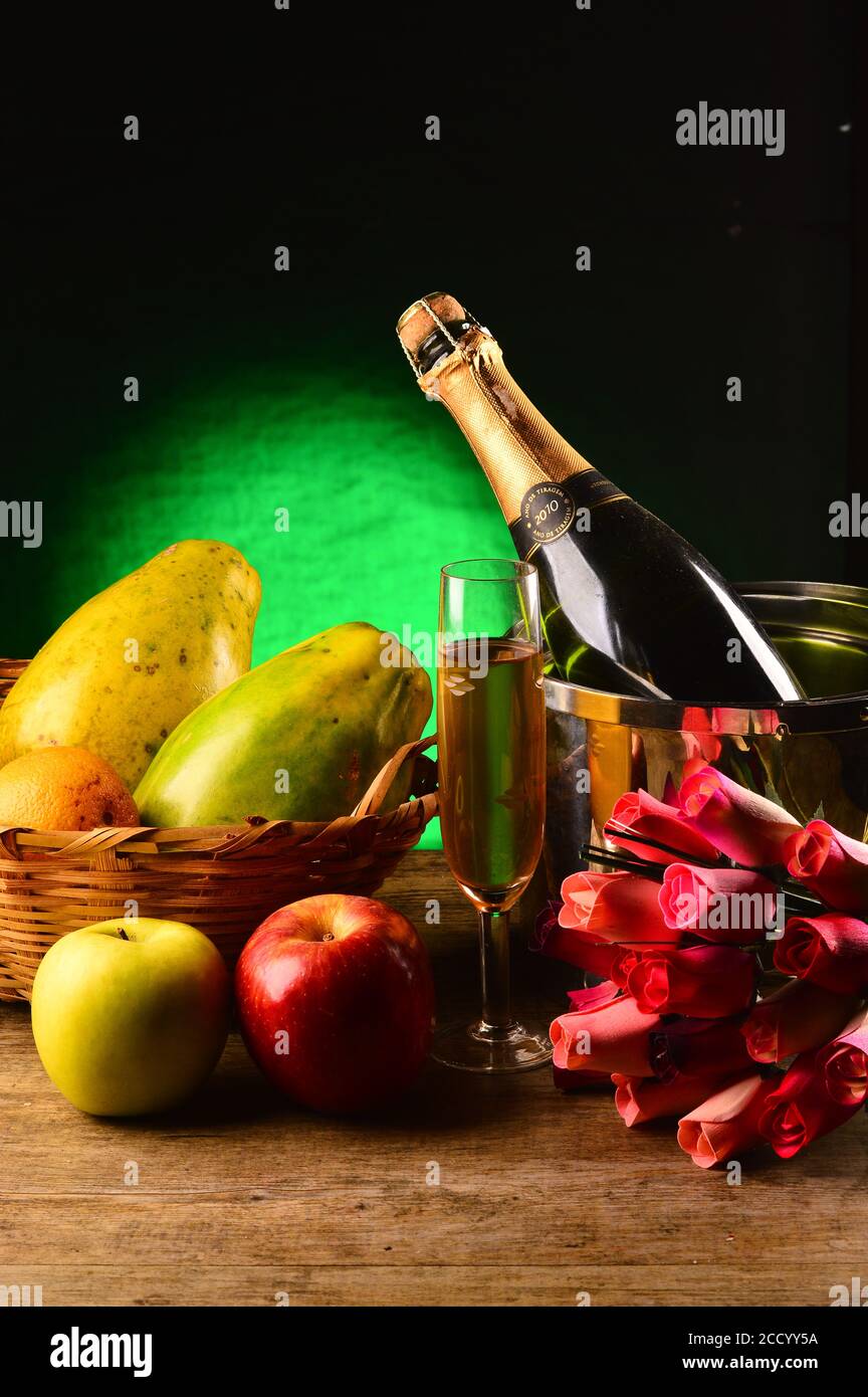 Bottle of Champagne on a basket Stock Photo