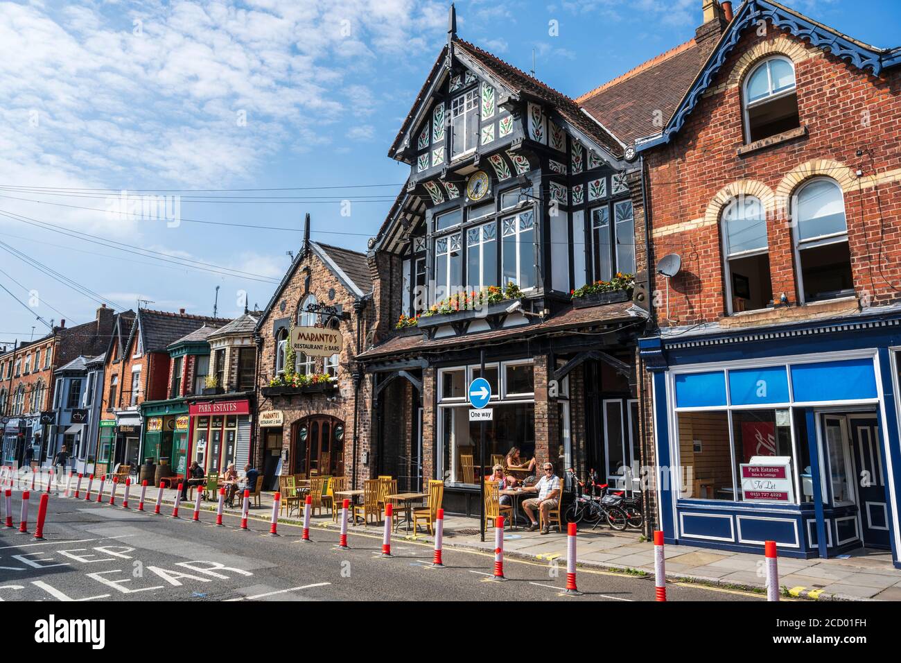 Shops, restaurants and cafes on Lark Lane, Liverpool, England, UK Stock