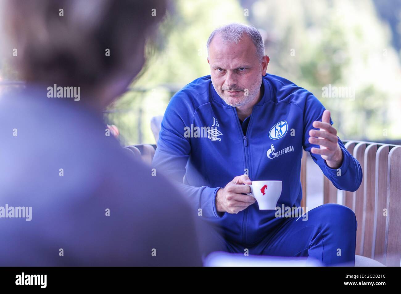 25 August 2020, Austria, Längenfeld: Schalke's board member for sports Jochen Schneider gives an interview to the German Press Agency (dpa). Due to the catastrophic financial situation at FC Schalke 04, squad planner Reschke and sports director Schneider's hands are tied. After two test match bankruptcies, there is already rumbling around the Bundesliga soccer club again. An access for the squad is not in sight. Photo: Tim Rehbein/dpa Stock Photo