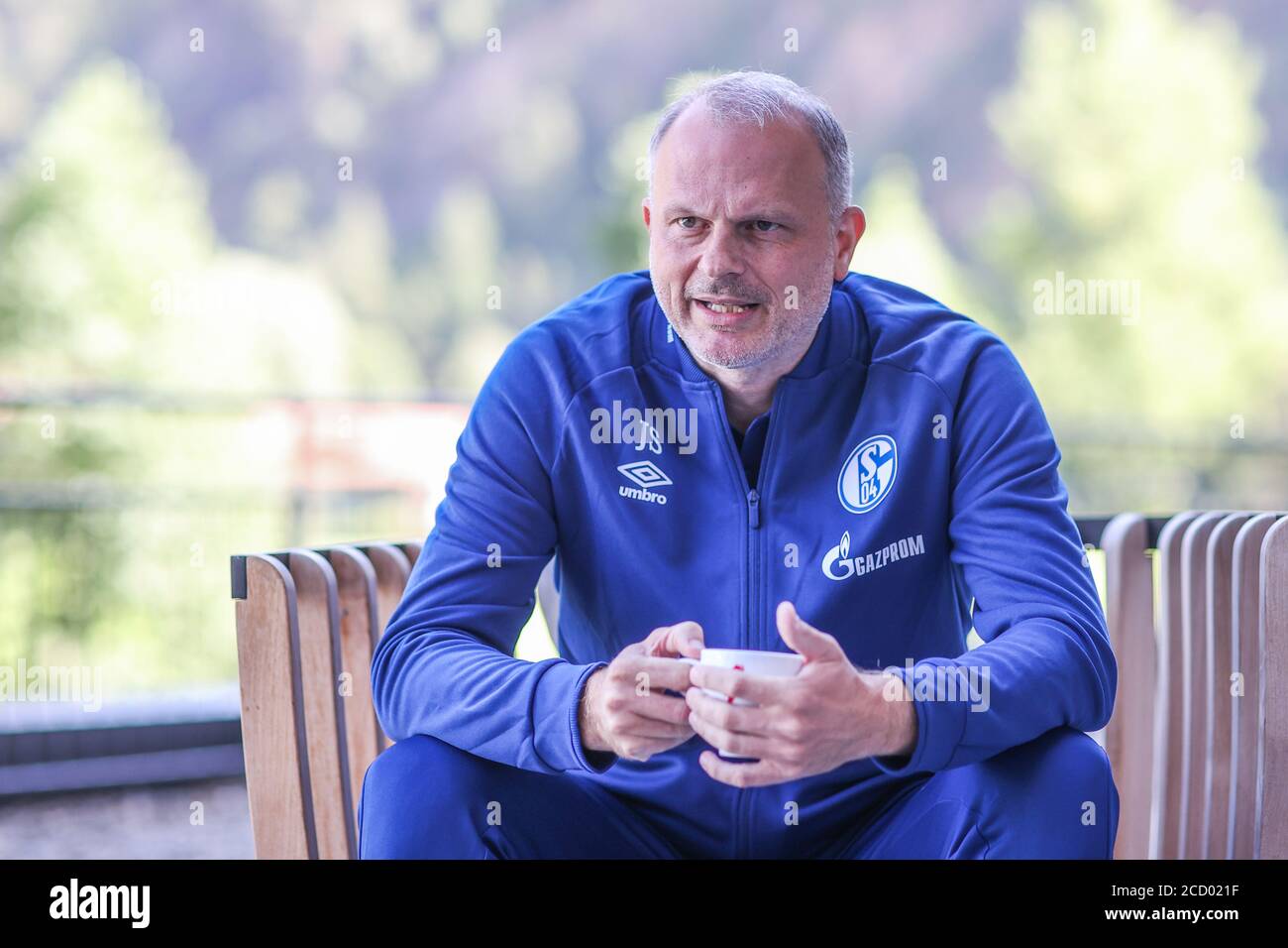 25 August 2020, Austria, Längenfeld: Schalke's board member for sports Jochen Schneider gives an interview to the German Press Agency (dpa). Due to the catastrophic financial situation at FC Schalke 04, squad planner Reschke and sports director Schneider's hands are tied. After two test match bankruptcies, there is already rumbling around the Bundesliga soccer club again. An access for the squad is not in sight. Photo: Tim Rehbein/dpa Stock Photo