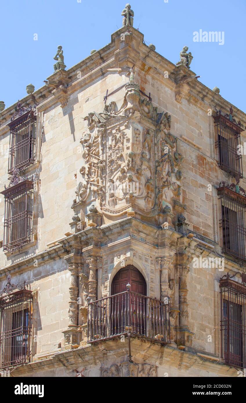 House-Palace of Marquis of Conquest or Marques de la Conquista, Trujillo, Spain. Corner Balcony and coat of arms Stock Photo
