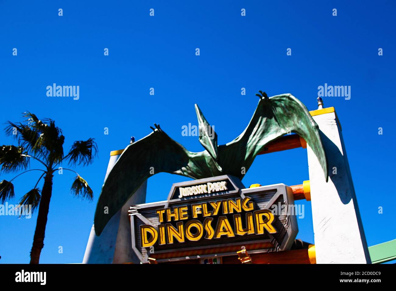 Sign of the Flying DINOSAUR station and Pteranodon figure at Universal