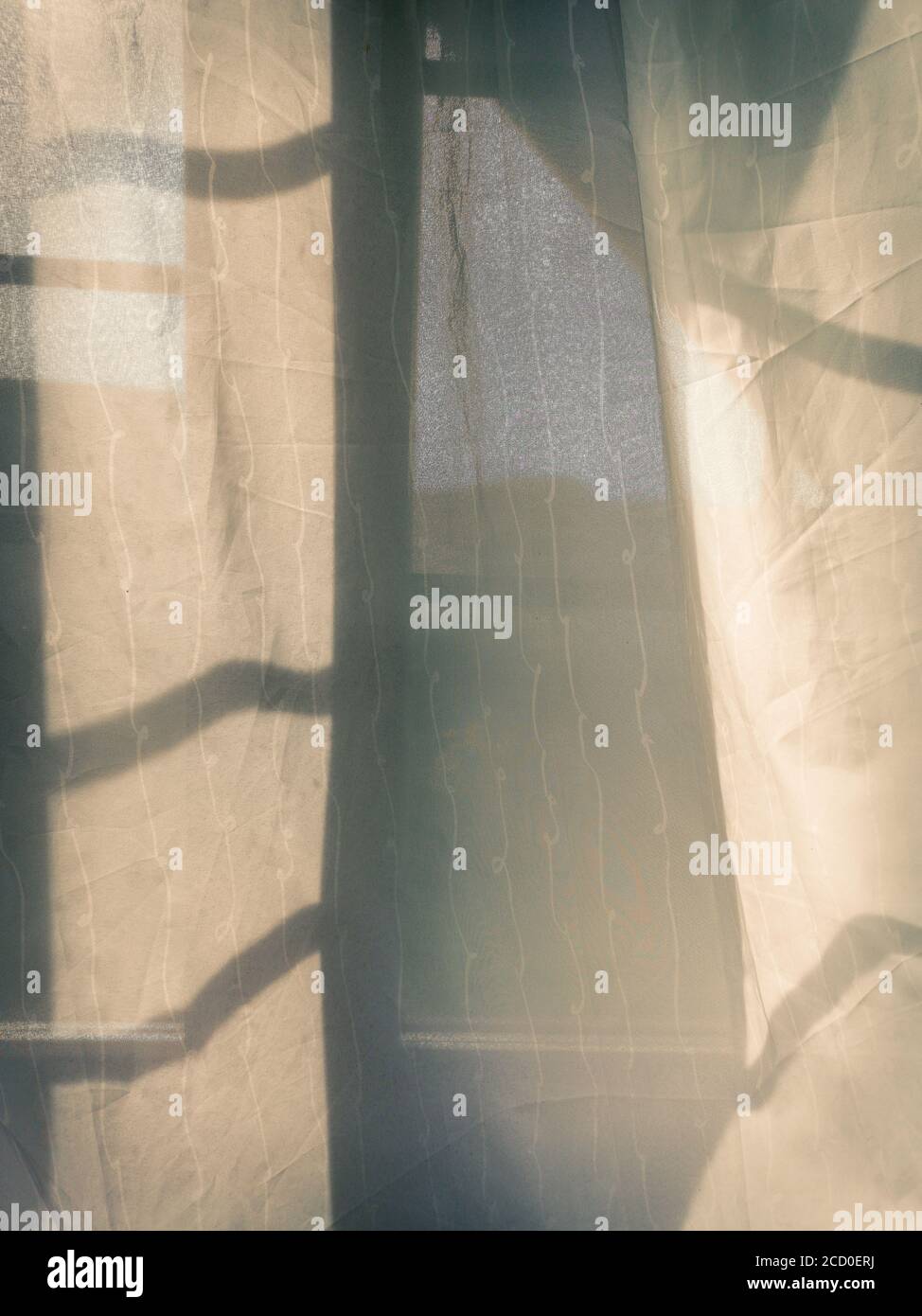 Curtains on the window. Abstract sunset background. Stock Photo