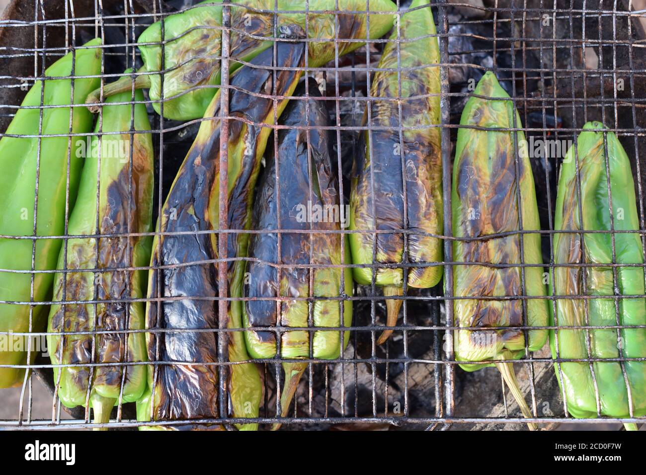 green peppers grilling on the barbecue for healthy lifestyle eating Stock Photo