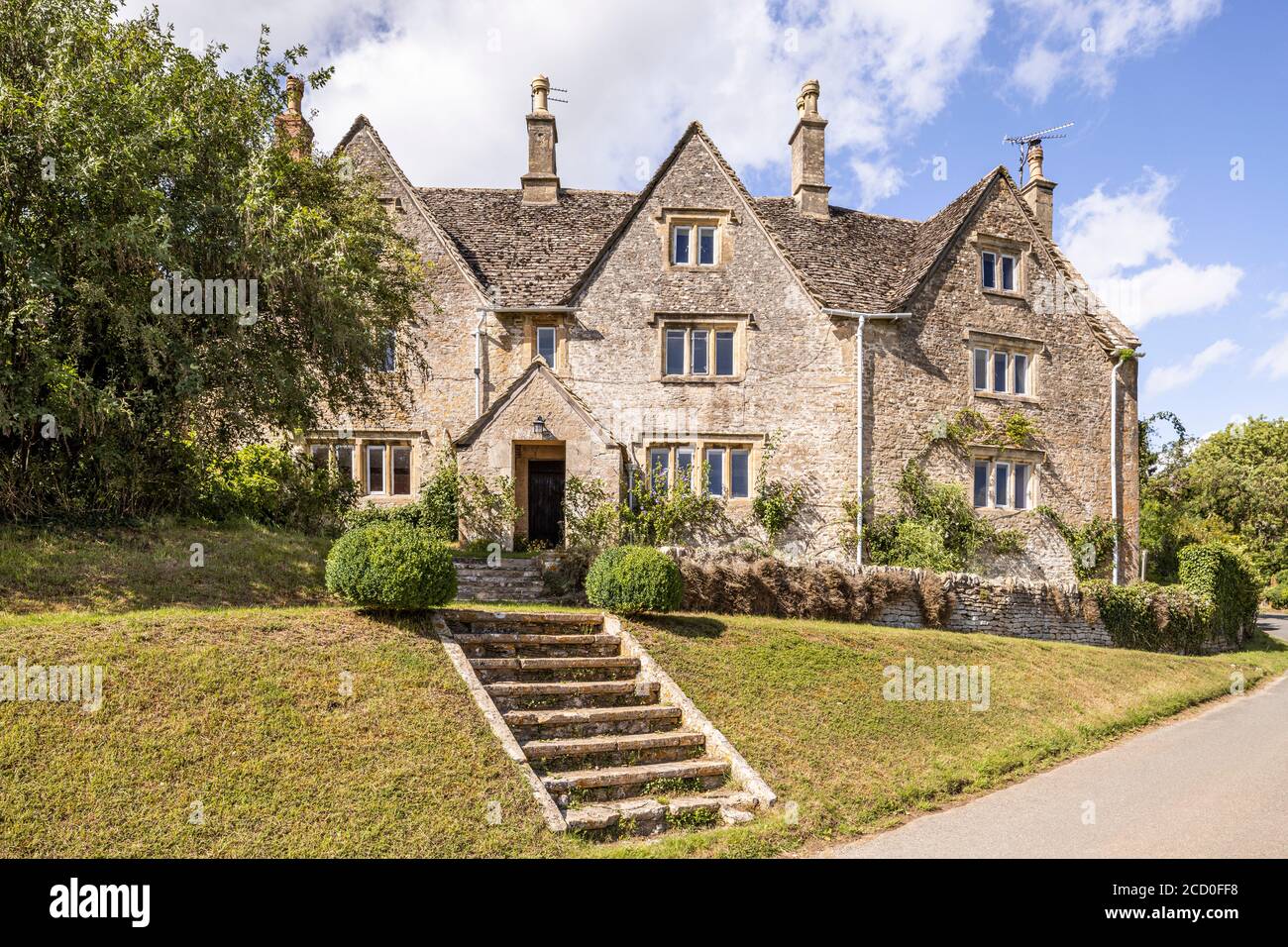 An old stone house in the Cotswold village of Calmsden Gloucestershire UK Stock Photo