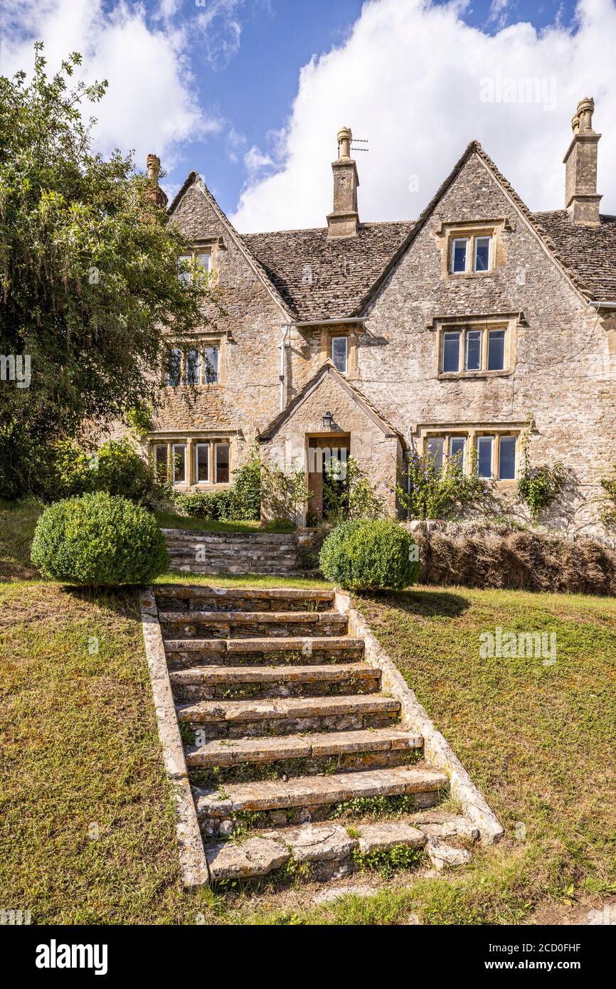 Steps leading up to an old stone house in the Cotswold village of Calmsden Gloucestershire UK Stock Photo