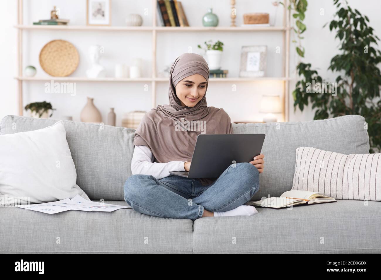 Distance Education. Young Muslim Girl In Hijab Studying With Laptop At ...