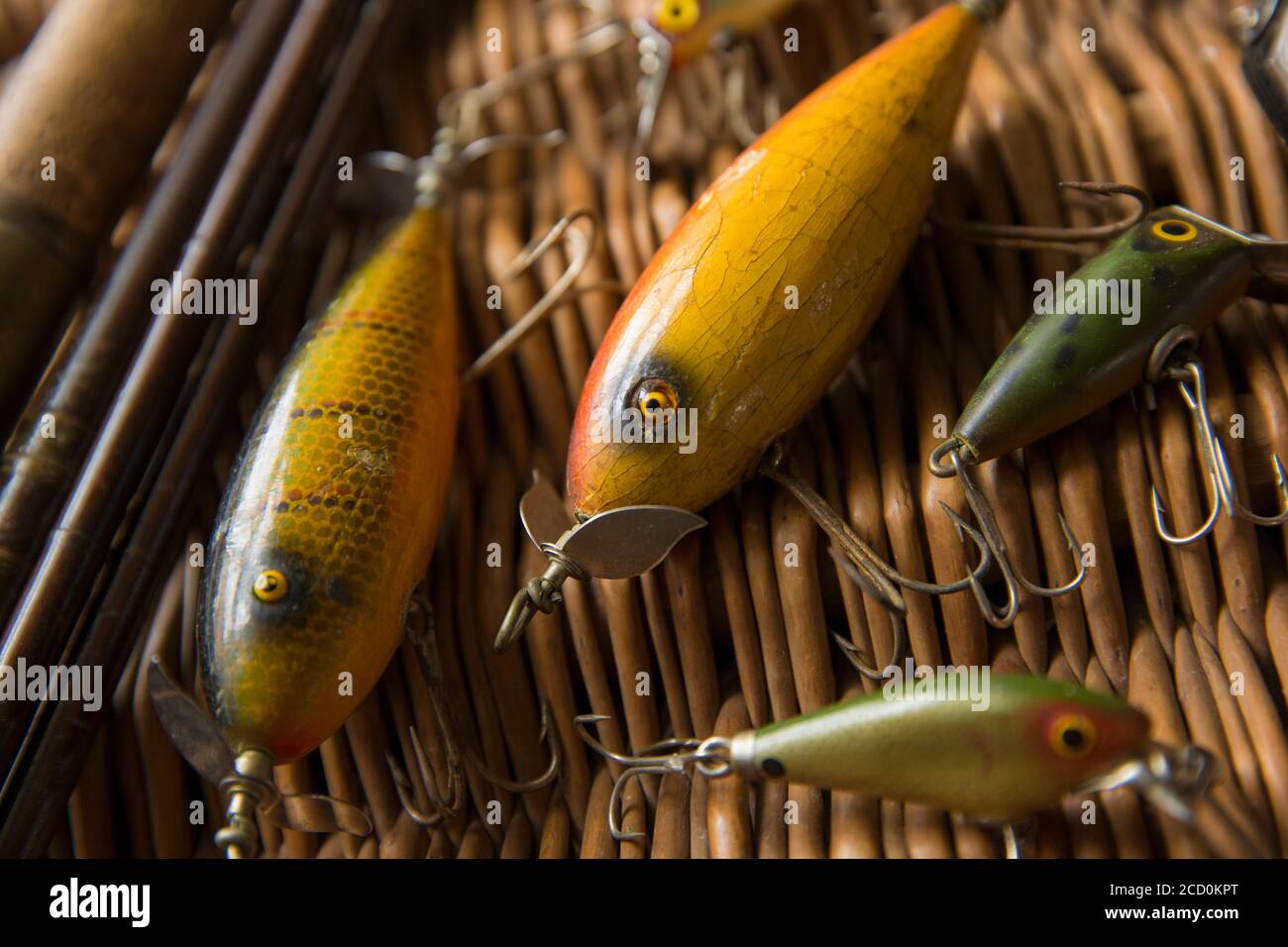 Examples of old South Bend fishing lures, or plugs, to catch predatory fish  displayed on a whicker tackle box. The larger lures are South Bend Stock  Photo - Alamy