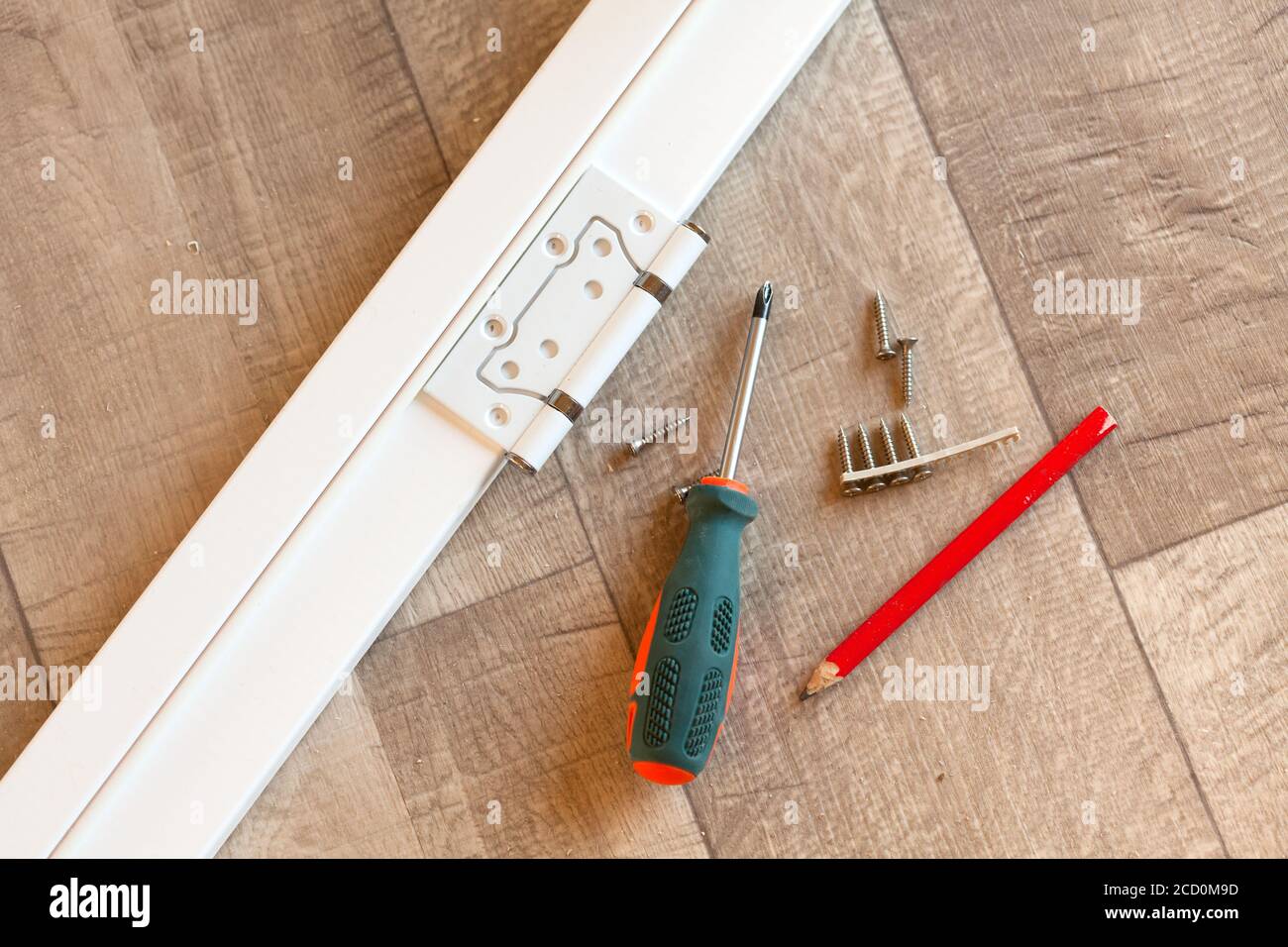Hinge on the white door frame Stock Photo