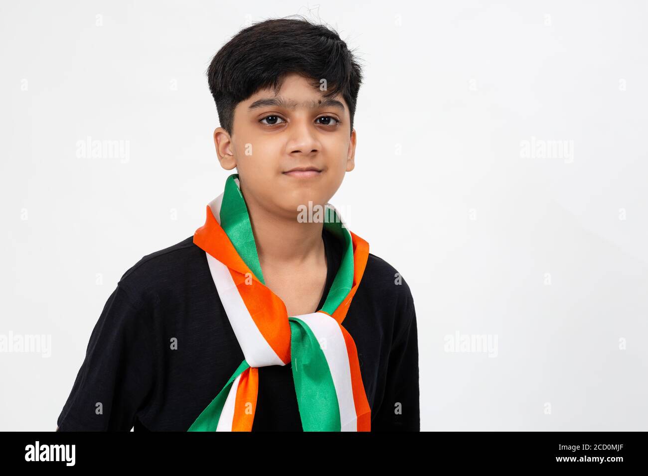 Young Indian boy wears a scarf with the colours of the Indian national  flag, Teenager wearing stylish neck tie Stock Photo - Alamy