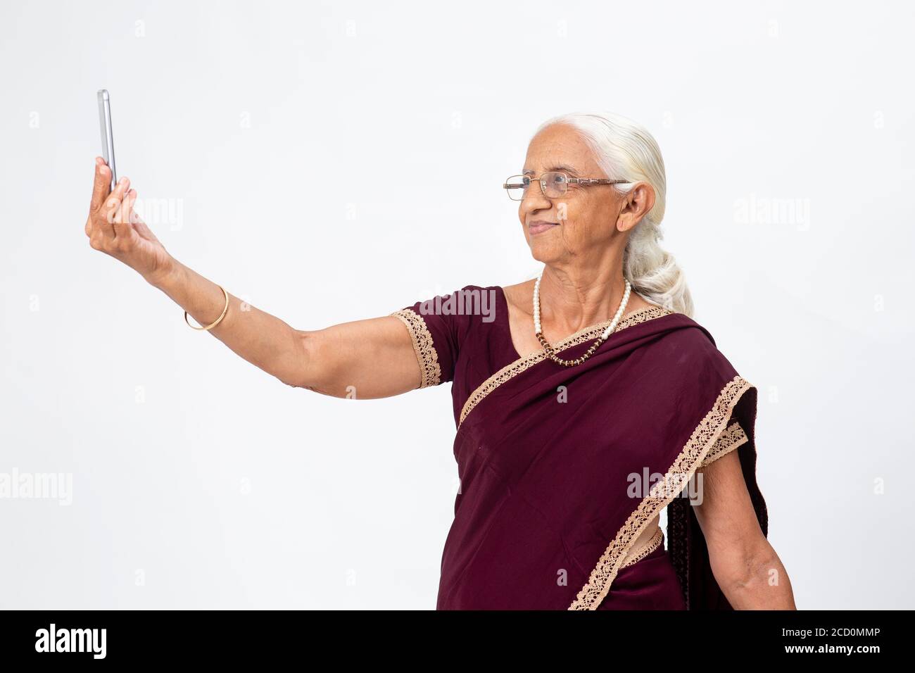 Older indian lady portrait hi-res stock photography and images - Page 3 -  Alamy