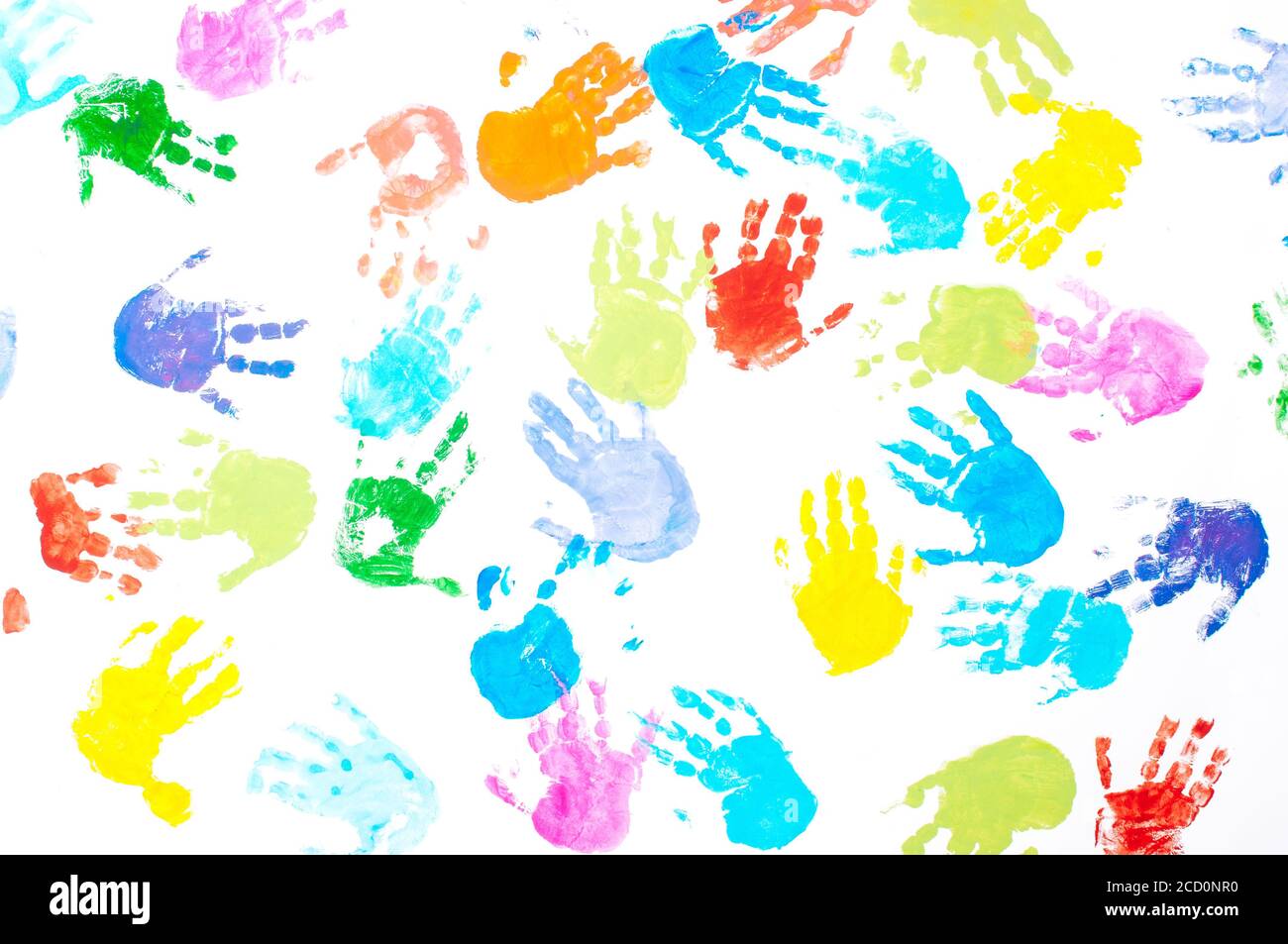 Multicolored kids handprints on white background. Top view, flat lay Stock  Photo - Alamy