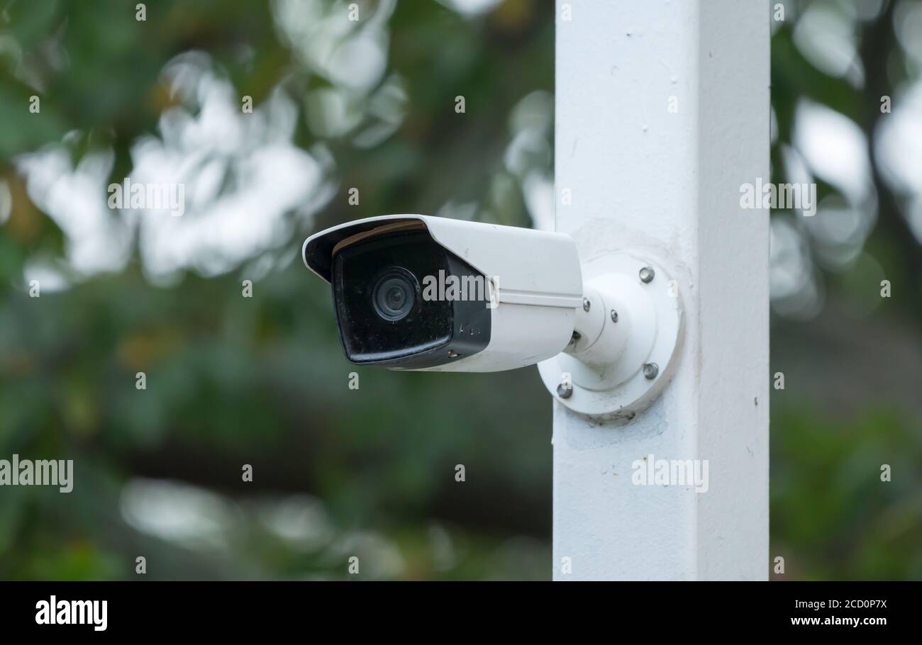 security camera, CCTV or surveillance camera technology used for safety in an urban area concept law and order Stock Photo