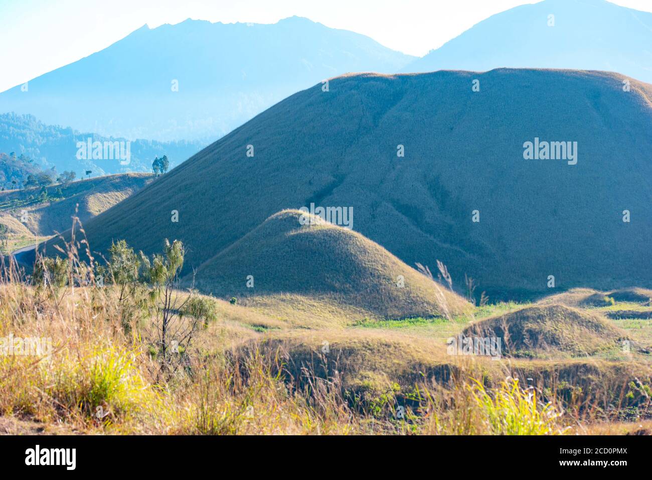 Rolling hills landscape on a sunny day Stock Photo - Alamy