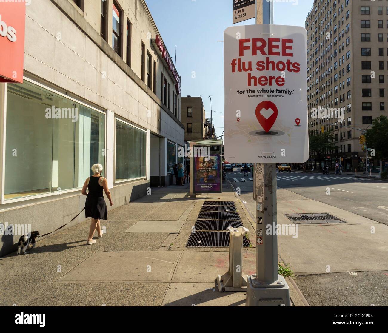 A sign in front of a CVS Health drugstore in New York on Tuesday, August 11, 2020 advertises the availability of the flu vaccine. (© Richard B. Levine) Stock Photo