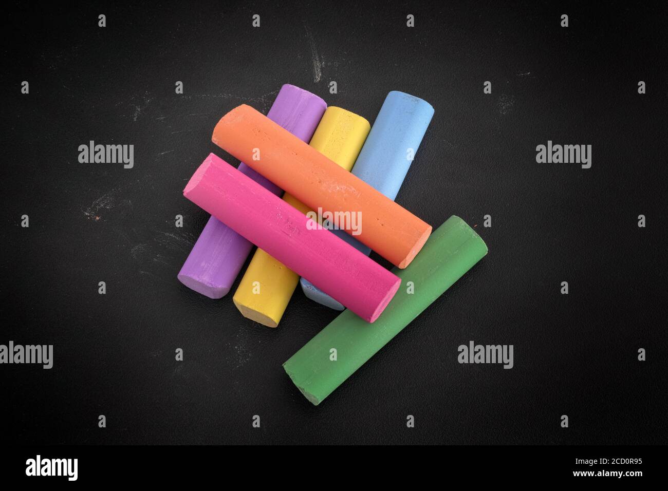 Variety Of Color Chalk On Blackboard. Stock Photo, Picture and