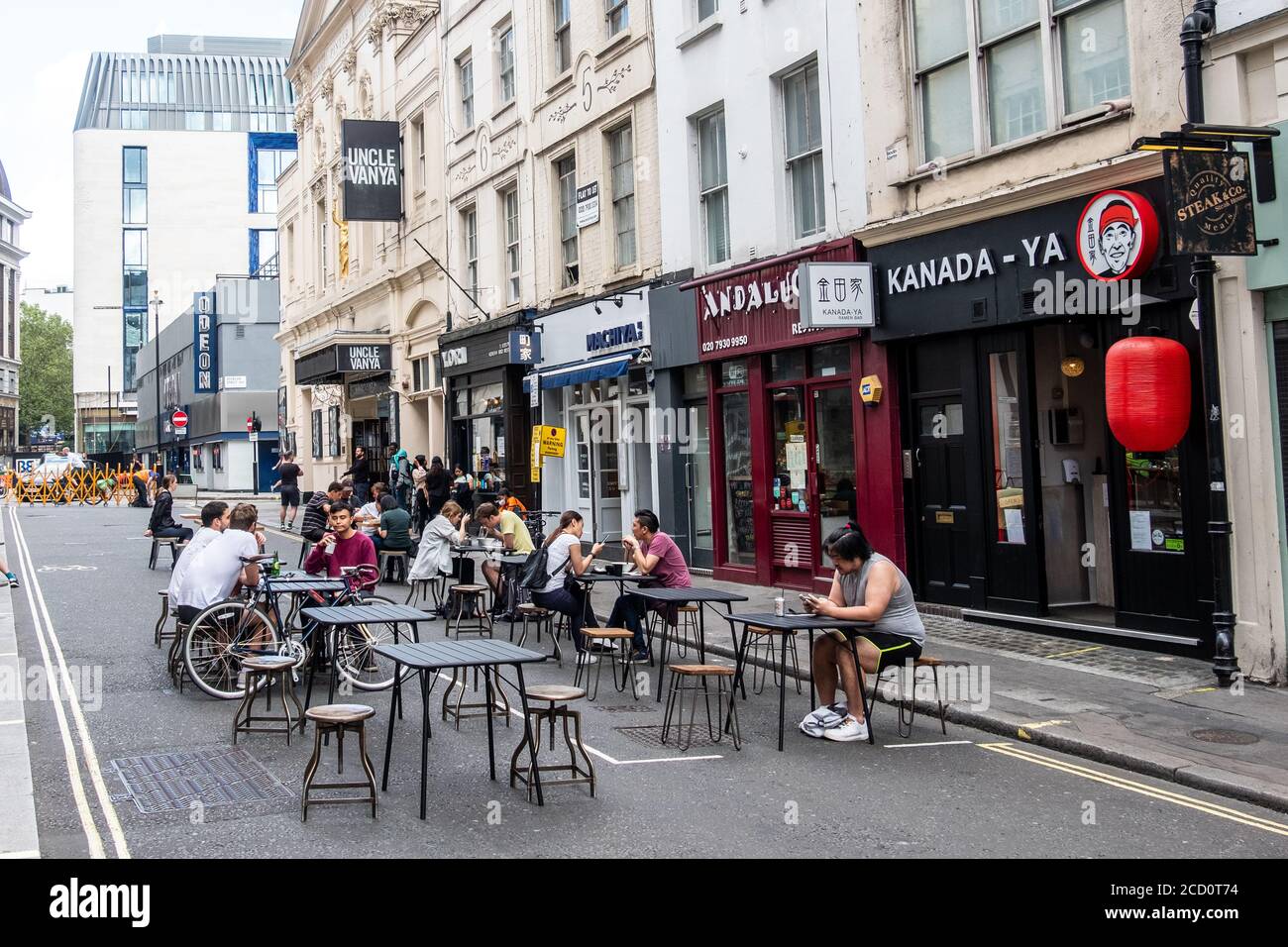 London- August, 2020: Temporary outdoor dining on a street in the West End to allow for social distancing due to the Covid 19 pandemic Stock Photo