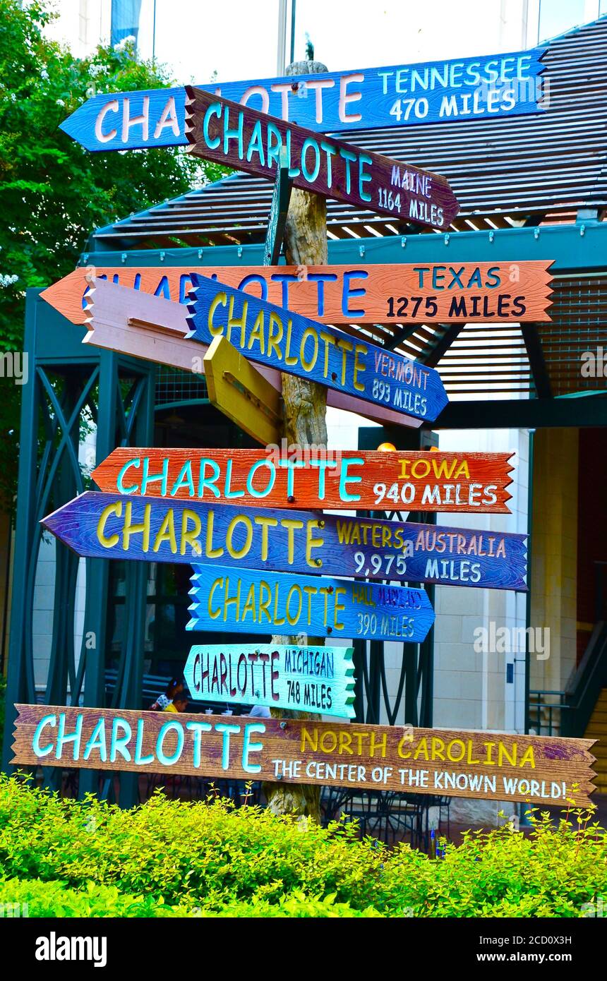 Colorful wooden street signs in Charlotte, North Carolina, indicating