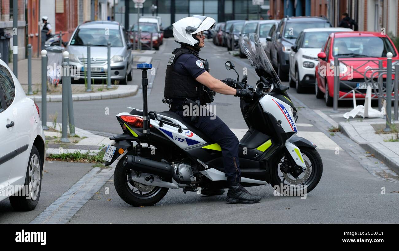 FRANCE,LILLE, 22 AUGUST 2020 : Policeman blocking the street with his  scooter during a demonstration in Lille Stock Photo - Alamy