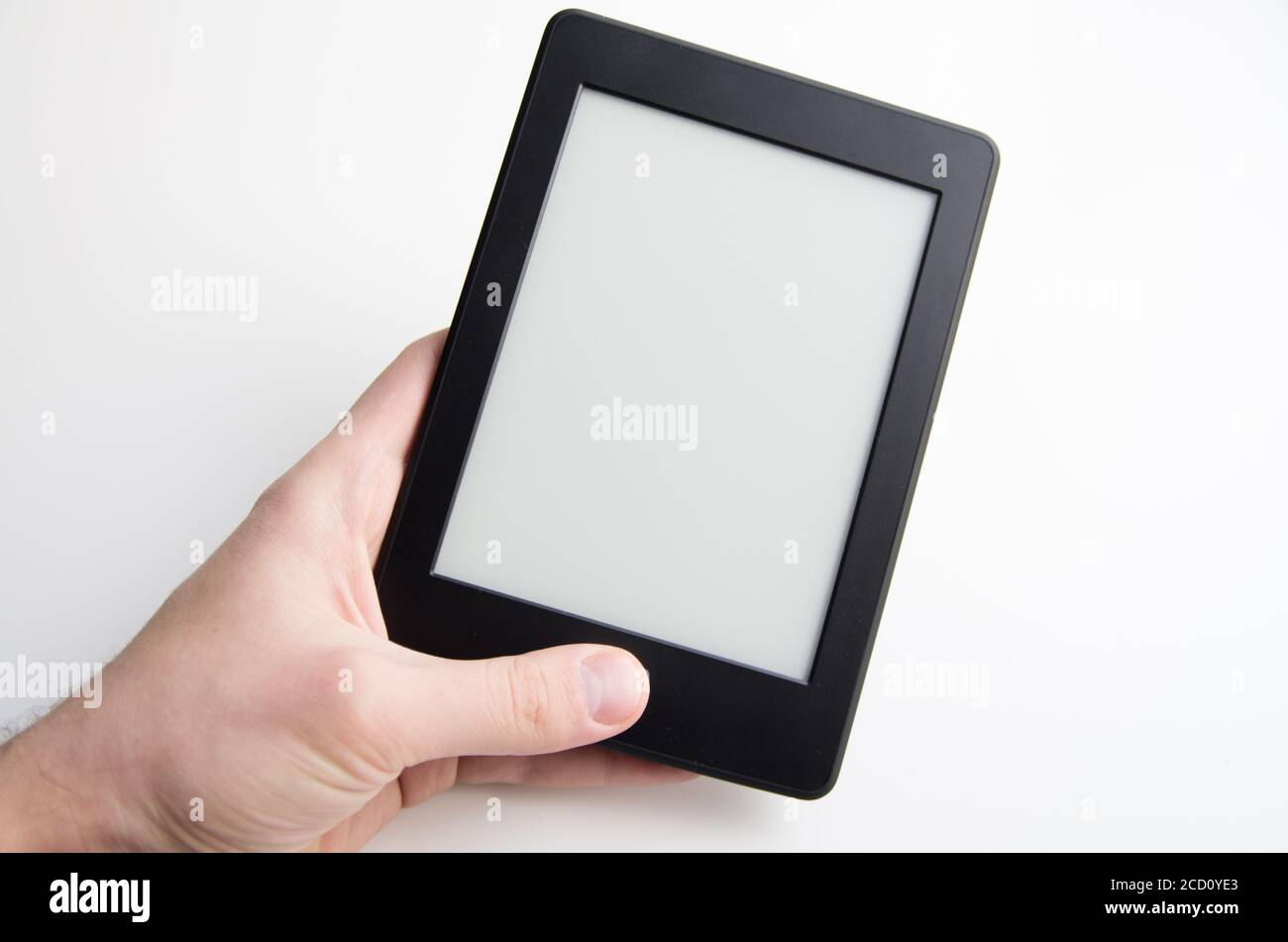Hand holding blank ebook with empty screen Stock Photo Alamy