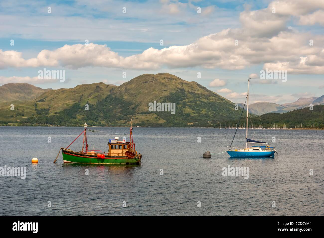 Two fishing boats in the sea in Oban , Scotland Stock Photo