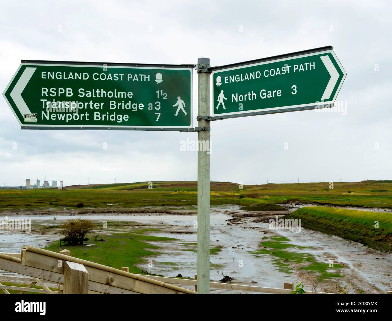 England Coast Path National Trail signpost Seaton Carew,  pointing west to RSPB Saltholme Transporter bridge and Newprt Bridge and east to North Gare Stock Photo