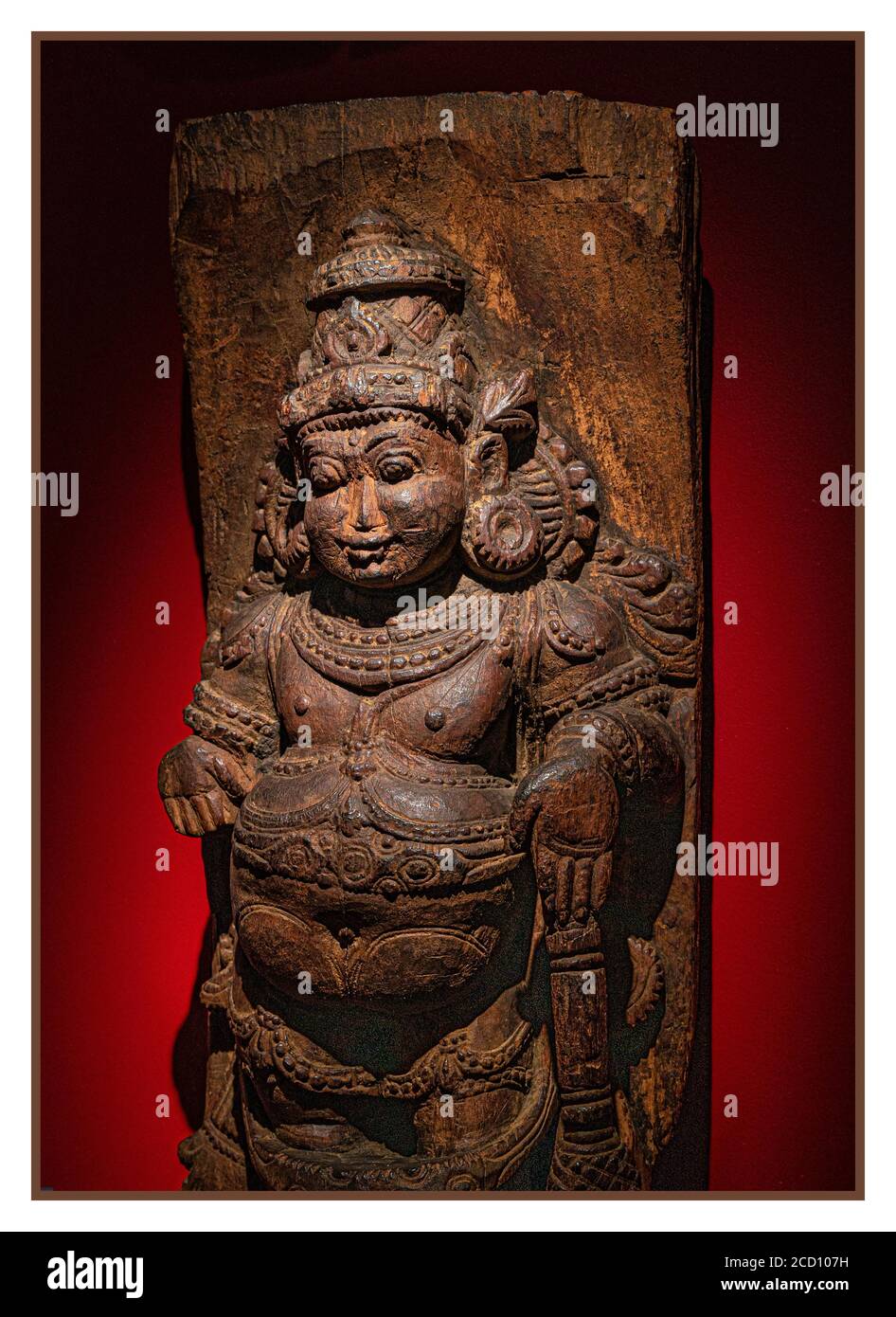 Wooden 19th Century carved statue carving deity from Southern India son of the God Shiva. Also called Kumara a fertility deity symbol where people pray to have descendants. Stock Photo