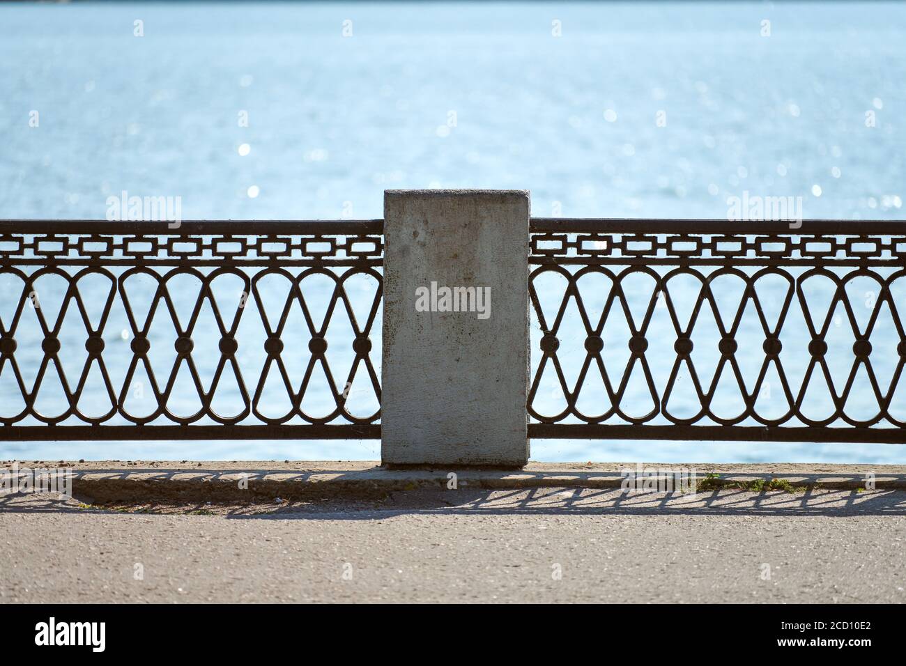 Iron fencing on waterfront. Riverside decor fence. Outdoor urban