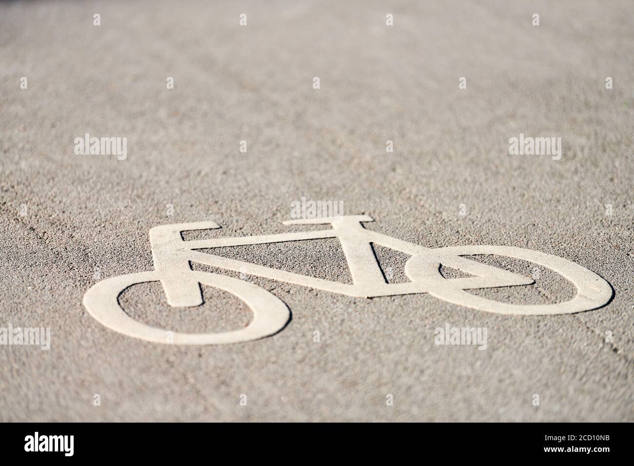 Bicycle sign on road. Bike lane sign only bikes allowed. Road marking