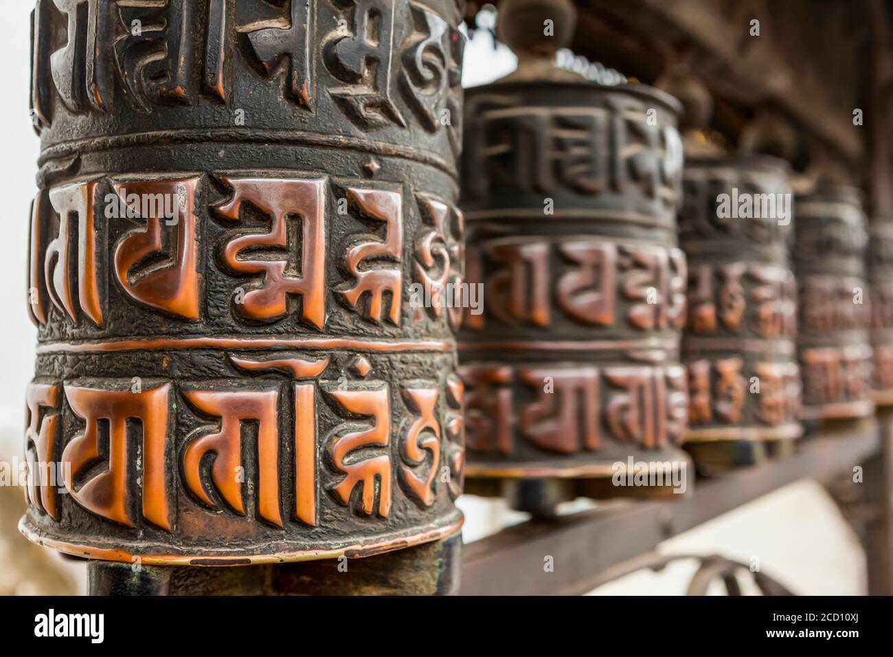 Buddhist prayer wheels at the Swayambhunath Monkey Temple in Kathmandu ...