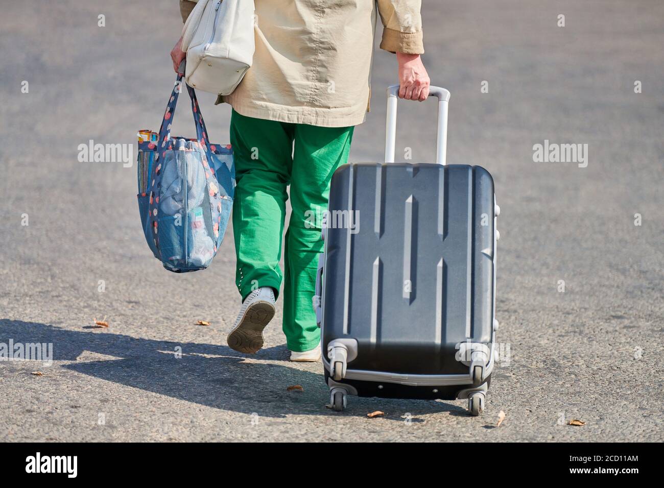 Travel Woman Walking In An Airport With A Luggage Baggage Carry-on