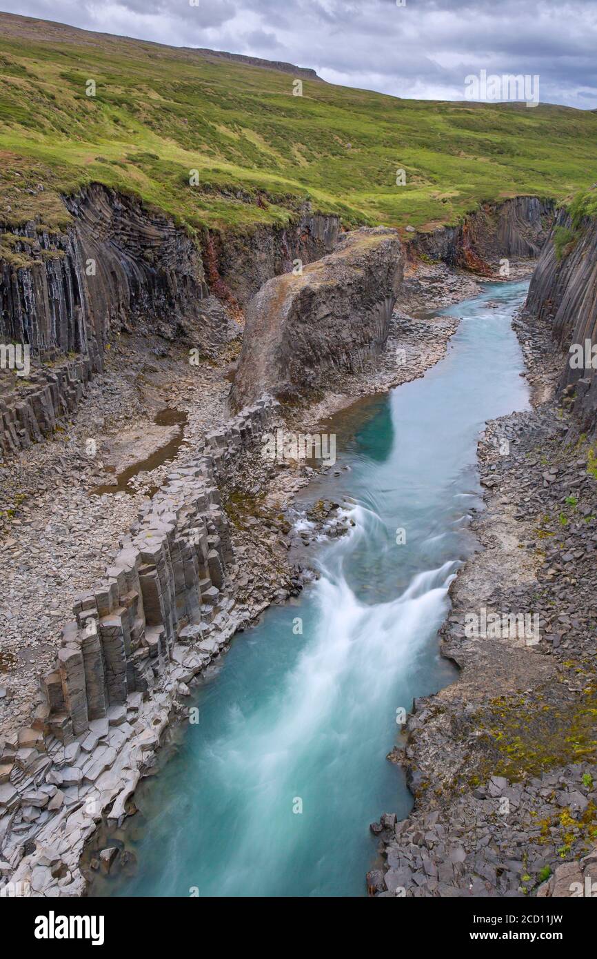 Jökla glacial river and basalt columns, volcanic rock formations at Studlagil / Stuðlagil Canyon, Jökuldalur / Glacier Valley, Austurland, Iceland Stock Photo