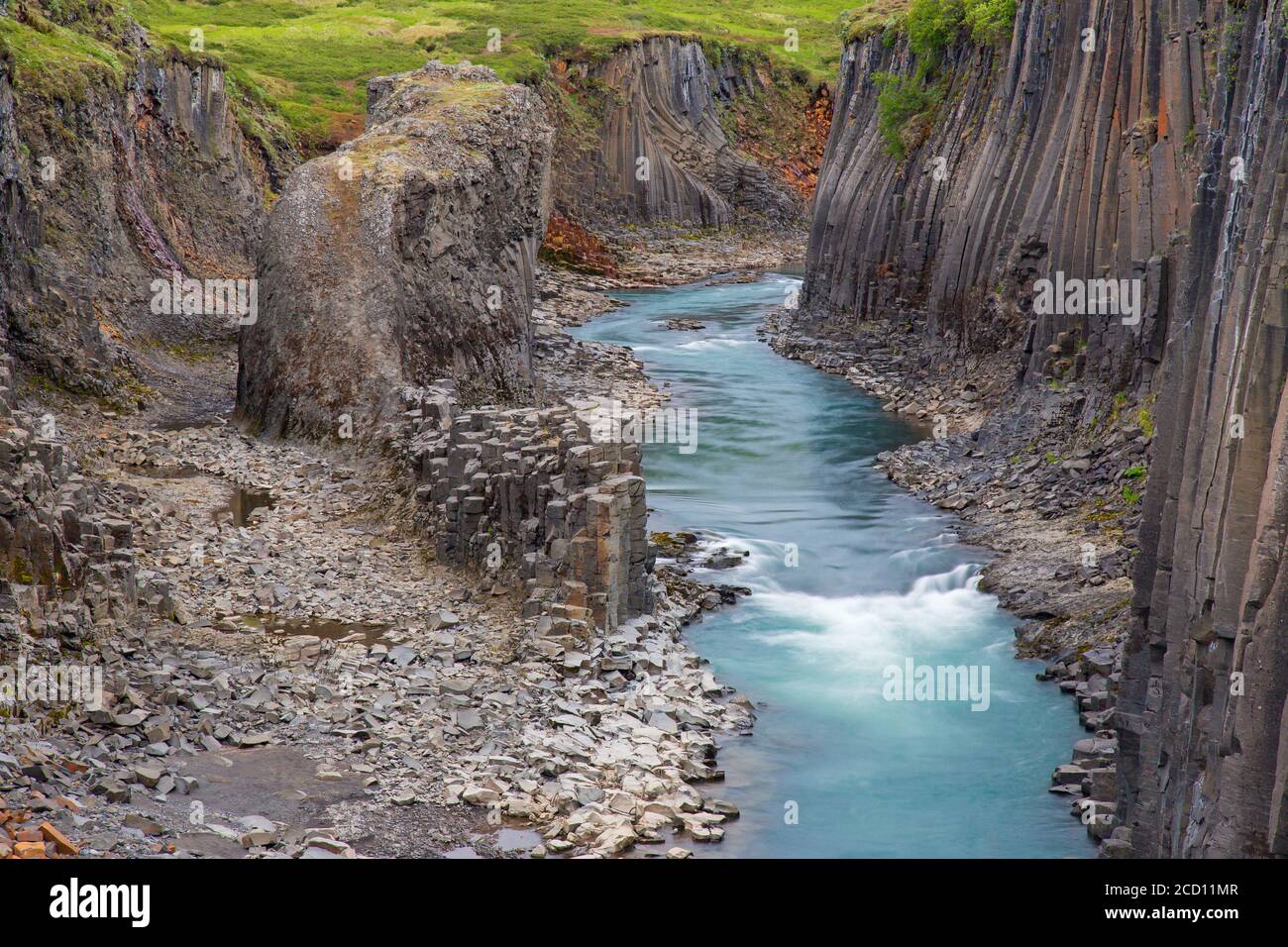 Jökla glacial river and basalt columns, volcanic rock formations at Studlagil / Stuðlagil Canyon, Jökuldalur / Glacier Valley, Austurland, Iceland Stock Photo