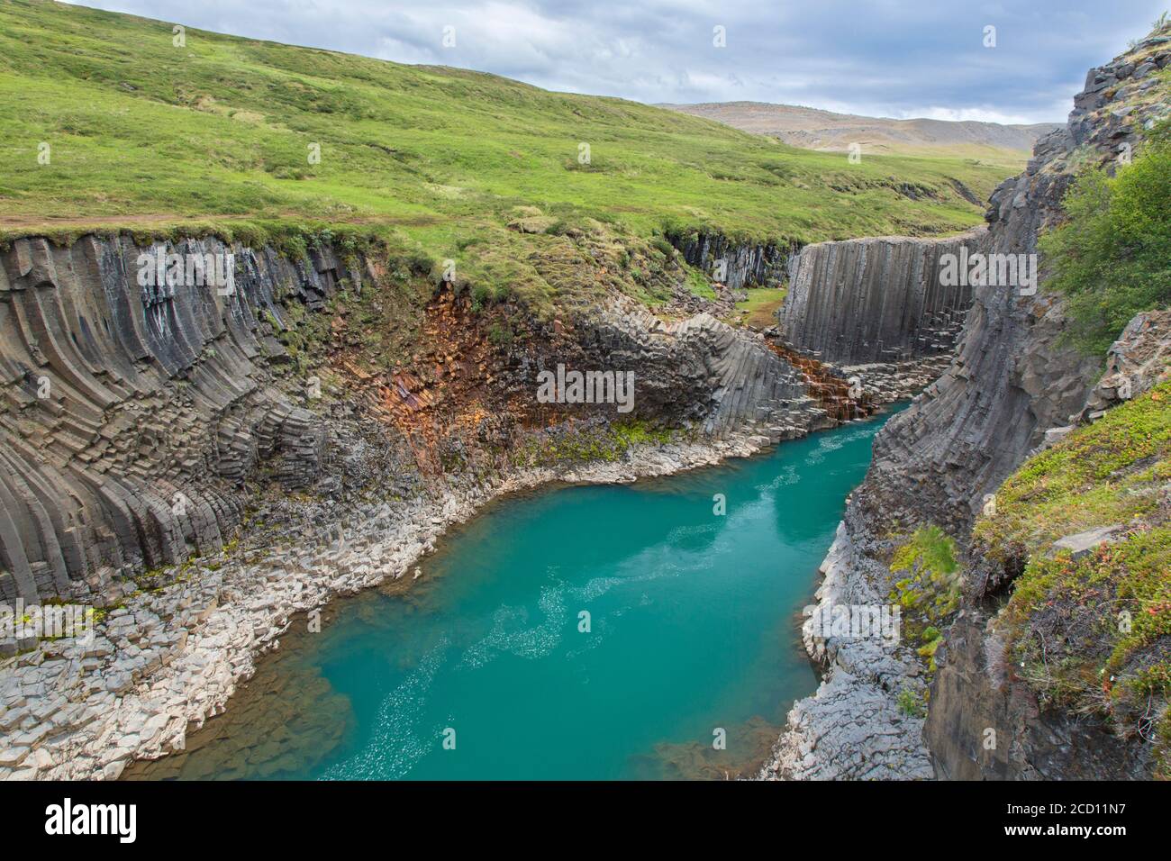Jökla glacial river and basalt columns, volcanic rock formations at Studlagil / Stuðlagil Canyon, Jökuldalur / Glacier Valley, Austurland, Iceland Stock Photo