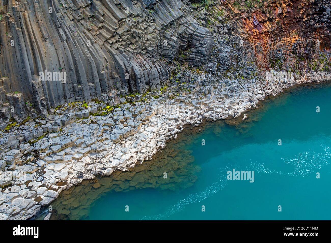 Jökla glacial river and basalt columns, volcanic rock formations at Studlagil / Stuðlagil Canyon, Jökuldalur / Glacier Valley, Austurland, Iceland Stock Photo
