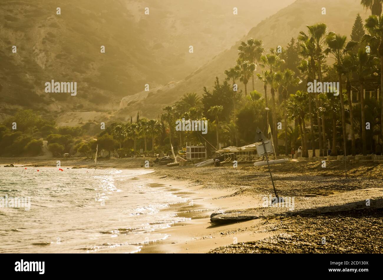 Empty beach and palm trees, Pissouri Bay; Limassol, Cyprus Stock Photo