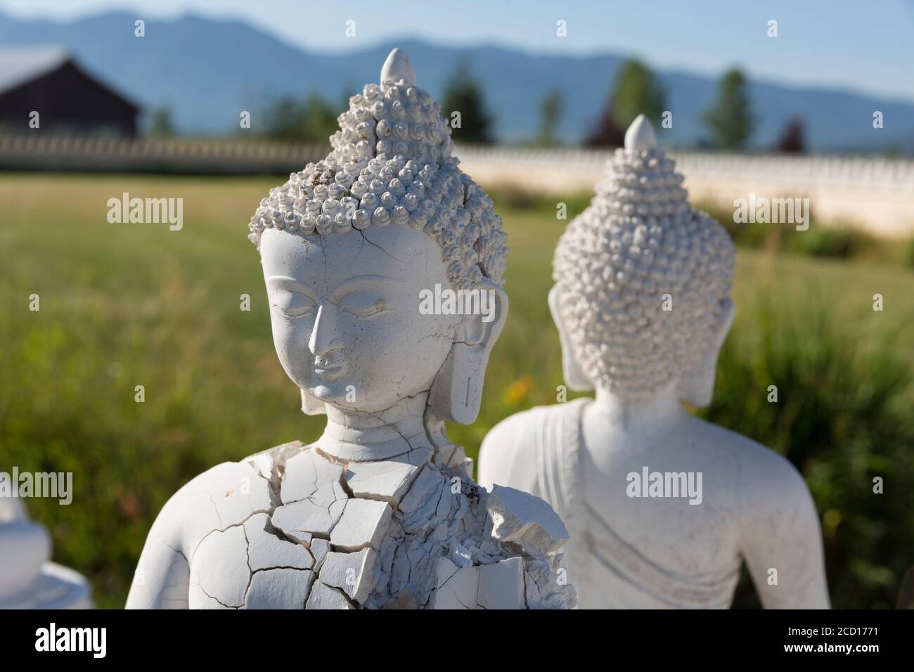 A Buddha statue crumbles at the Garden of One Thousand Buddhas in Arlee