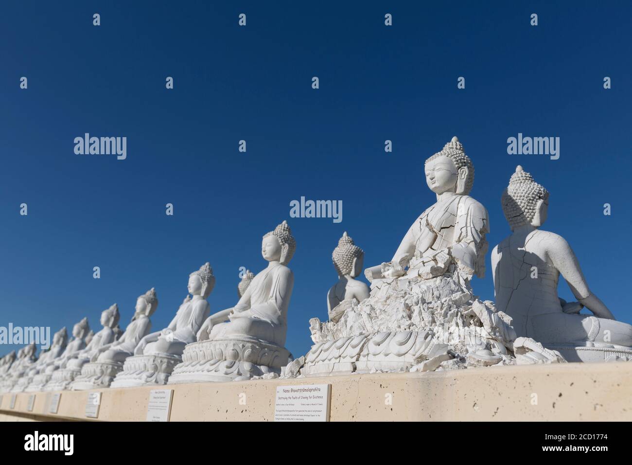 A Buddha statue crumbles at the Garden of One Thousand Buddhas in Arlee