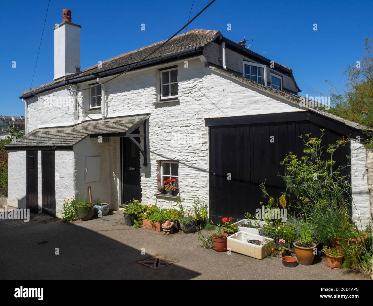 Traditional whitewashed Cornish cottage, Portscatho, Cornwall, UK Stock Photo