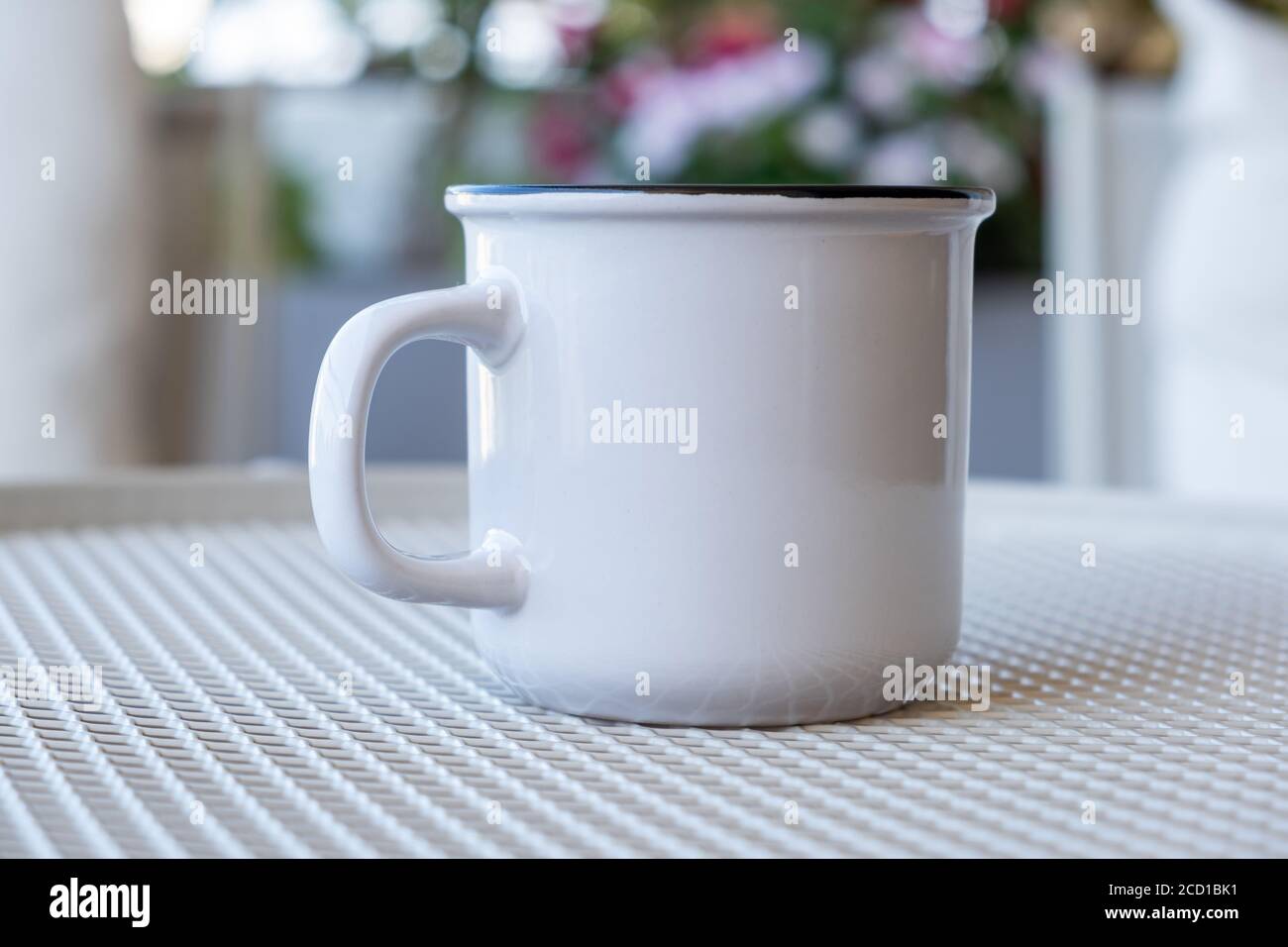 Download Coffee Cup Mockup On A Garden Table White Color Blank Mug With Handle For Hot Beverage Blur Blooming Flowers Background Advertise Branding Templat Stock Photo Alamy