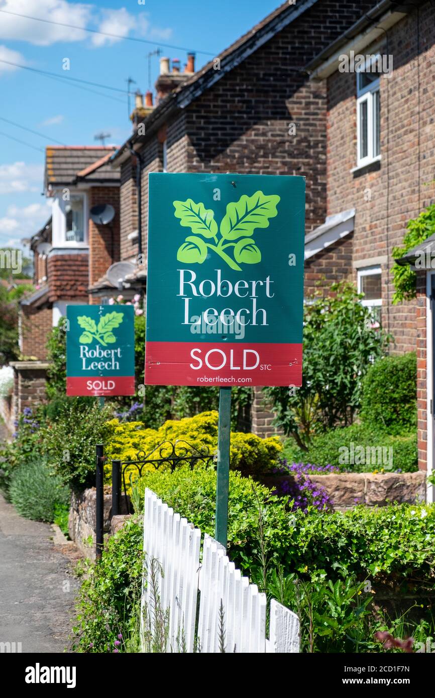 Houses sold signs in Lingfield, Surrey, England, UK Stock Photo Alamy